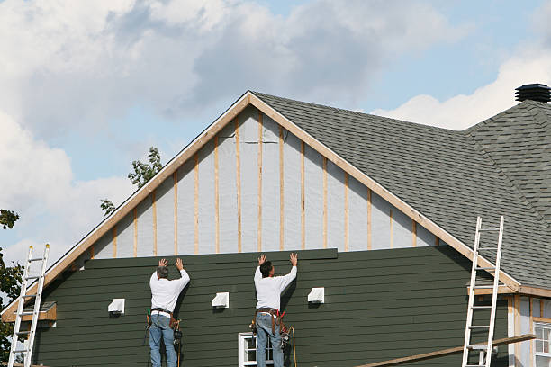 Professional Siding Installation technician working in Covington, GA